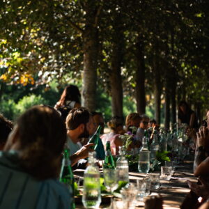 Long forest table dining under trees during SYLVA at Yūgen Forest